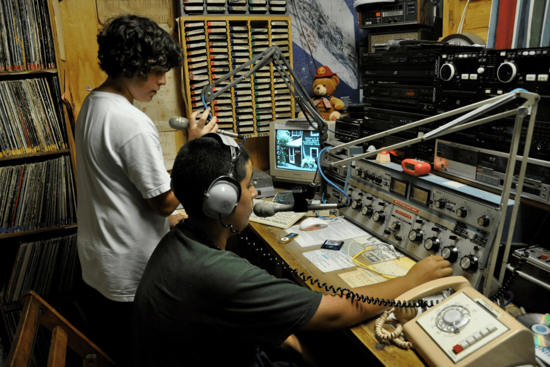 ampers working with audio equipment indoors