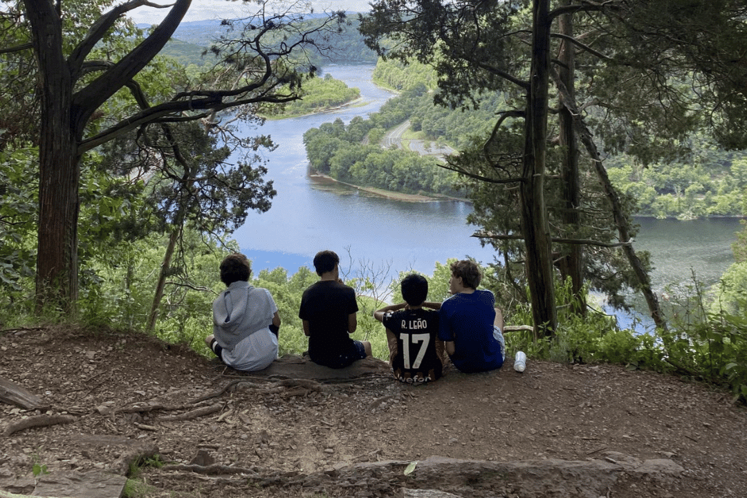 campers overlooking a lake during outdoor activity