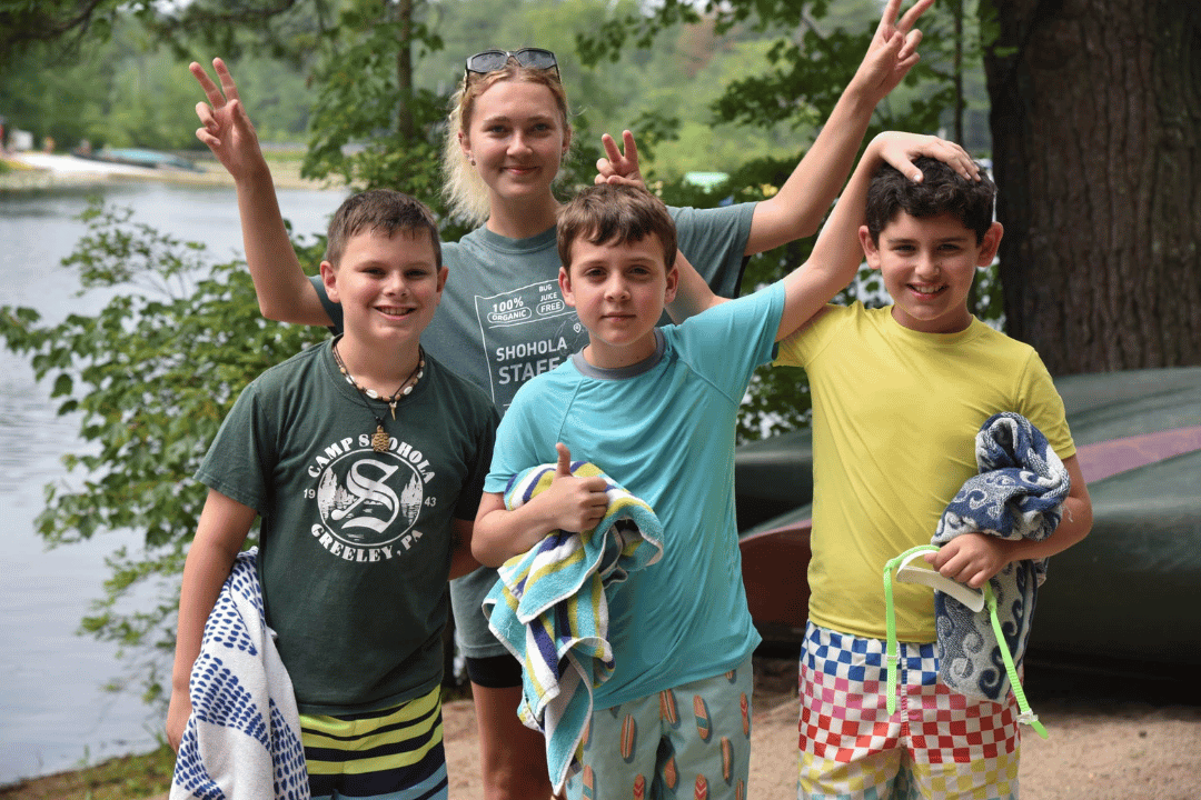 campers smiling during group activity outdoors