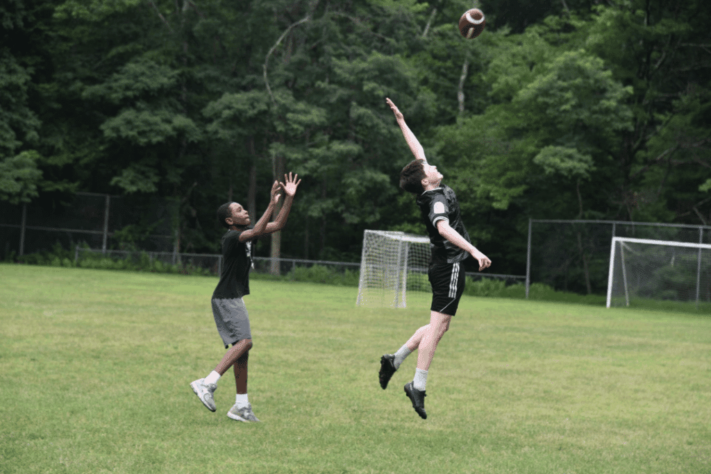 boys participating in summer camp sports activities