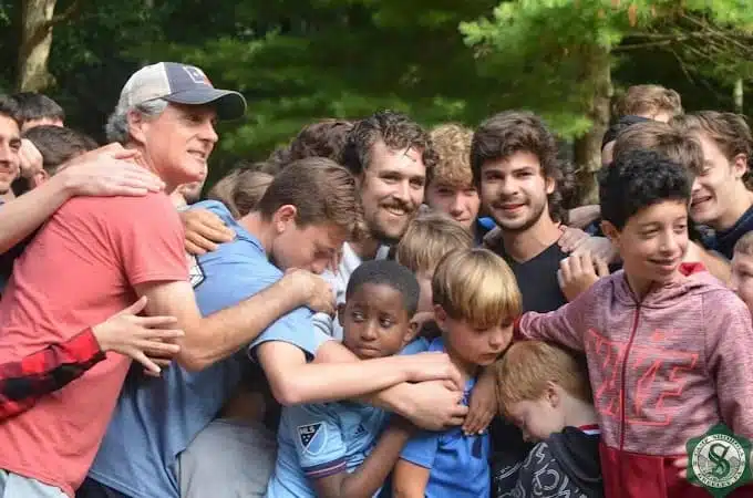 Large group recreation activity at Camp Shohola for Boys featuring campers playing together at a fun and active boys summer camp